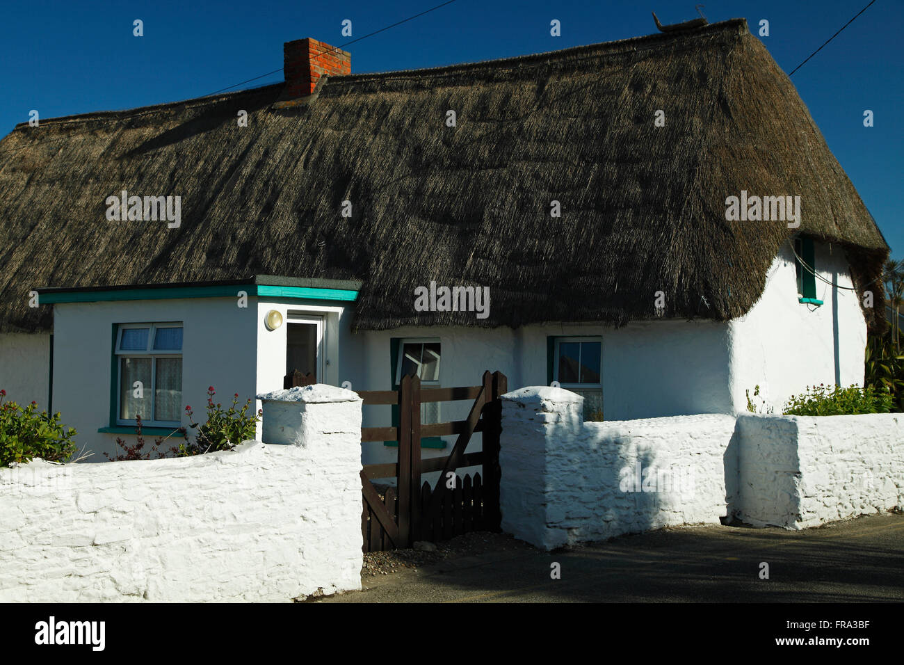 Thatch cottage in Kilmore Quay village; County Wexford, Ireland Stock