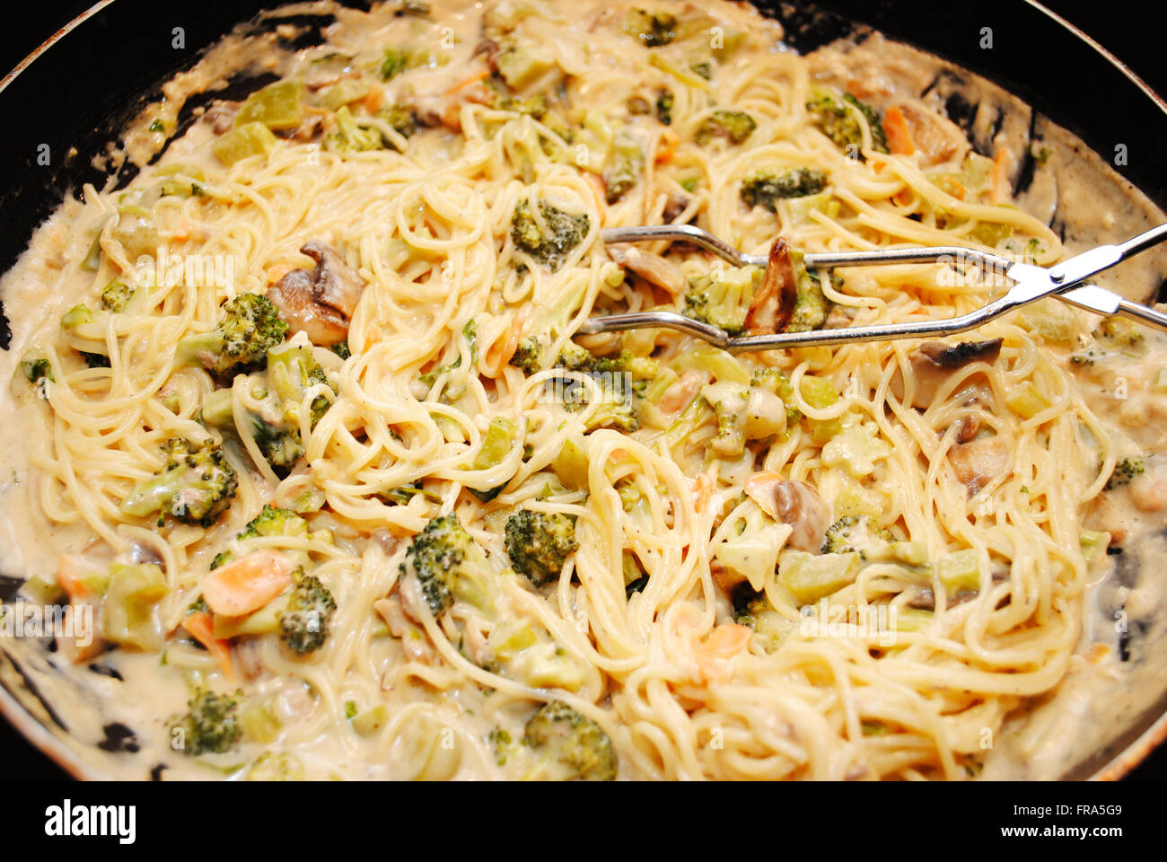 Mixing spicy sauce with noodles hires stock photography and images Alamy