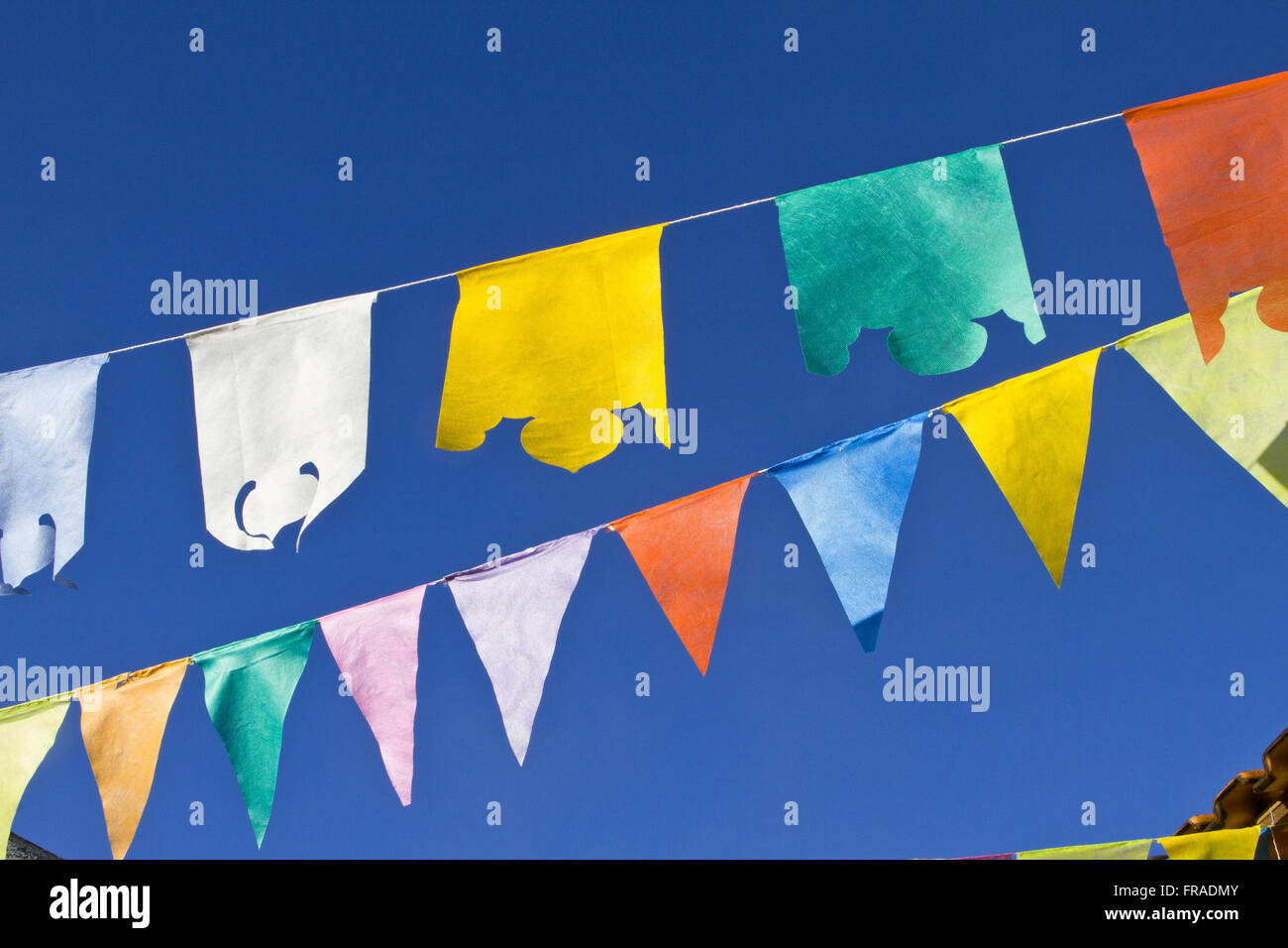 Pennants decorating the streets during religious festival Stock Photo