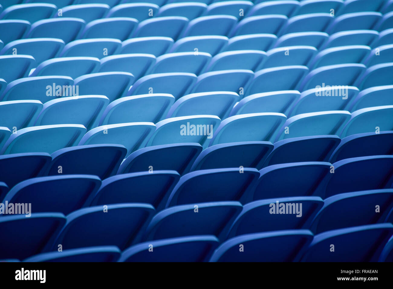 Detail Of Blue Chairs In The Football Stadium Bleachers Stock
