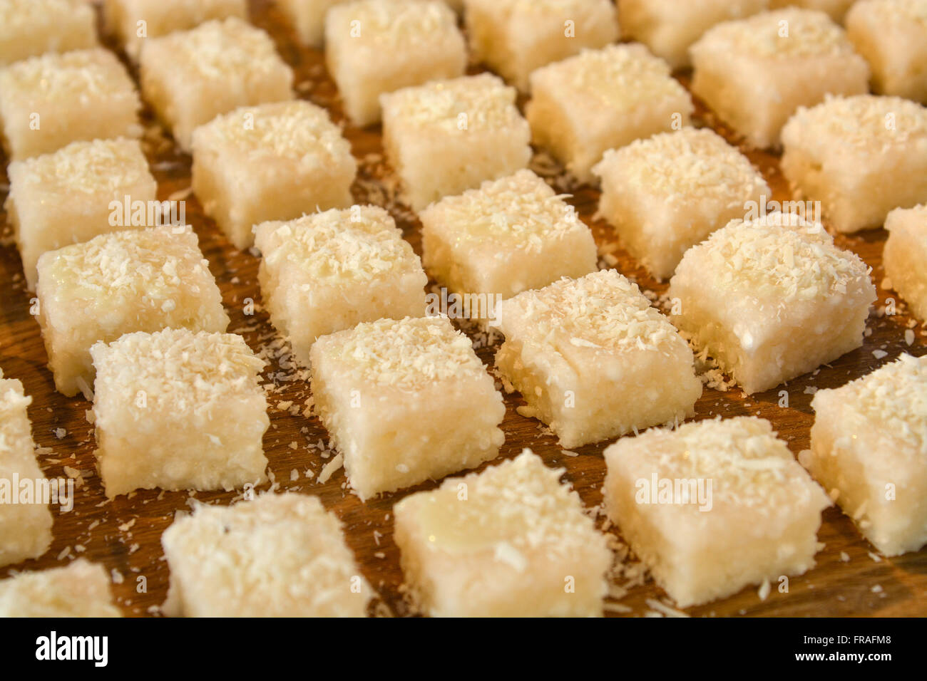 Pieces of coconut couscous Stock Photo