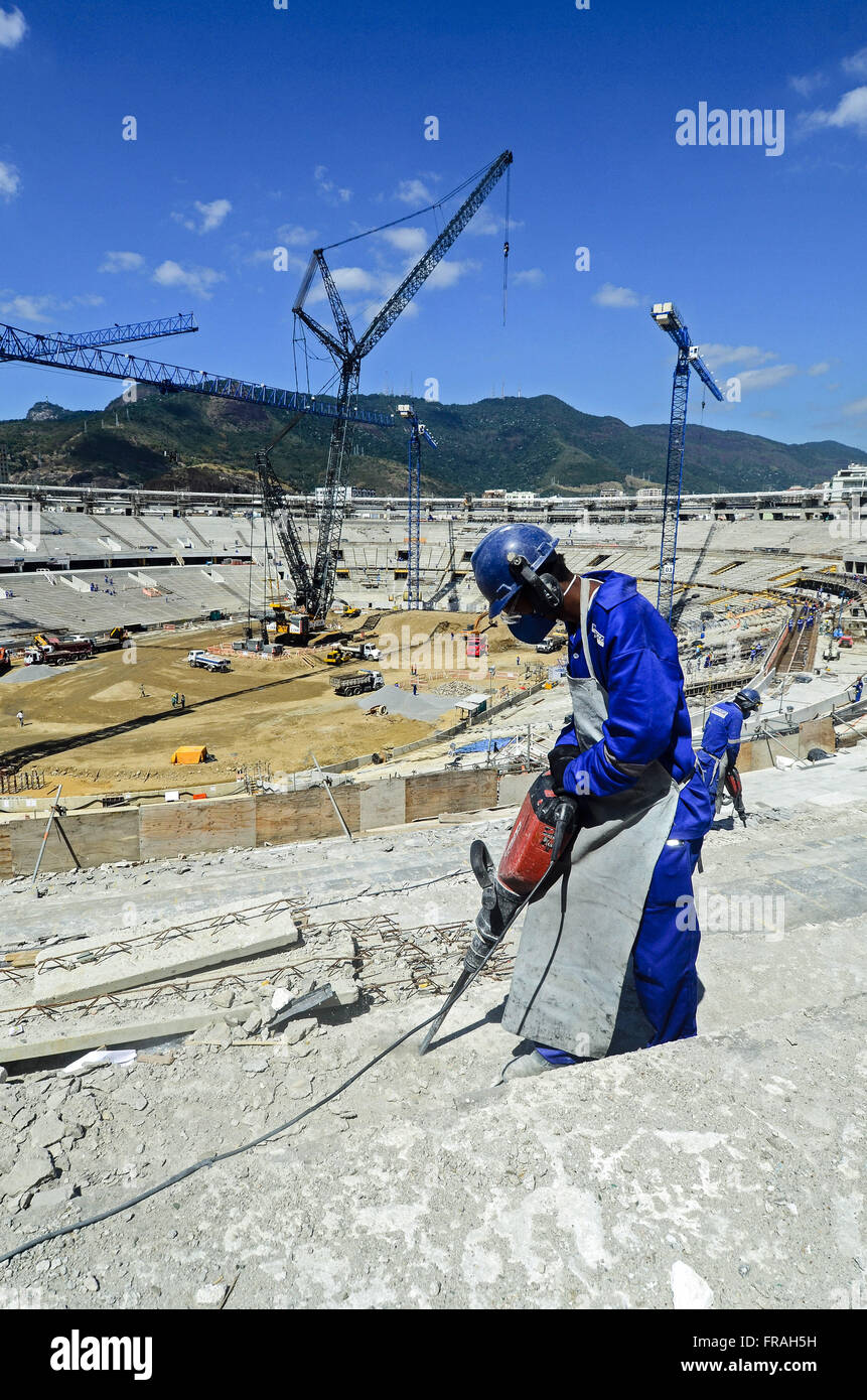 Workman with drill in the work of reforming the Estadio do Maracana for the World Cup 2014 Stock Photo
