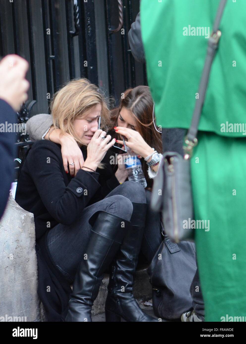 November 14th 2015. Paris, France. Mourners break down in tears at the full horror of the previous evening emerges. ©Marc Ward/Alamy Stock Photo