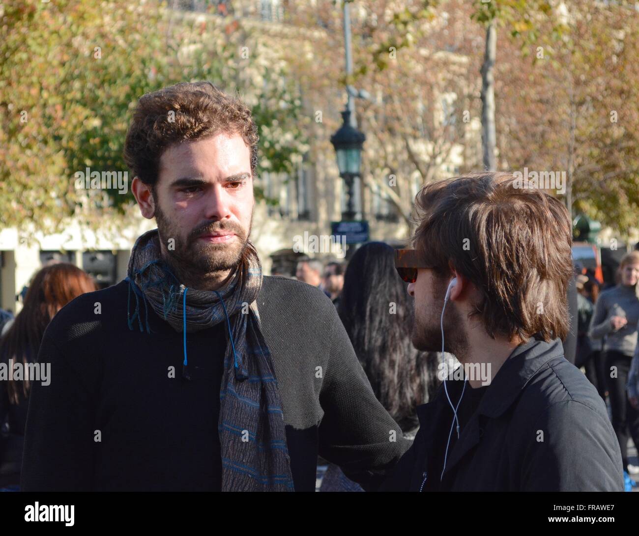 November 15th 2015. Paris, France. A man bursts into tears in the Place de la République as the events become all too much. ©Marc Ward/Alamy Stock Photo