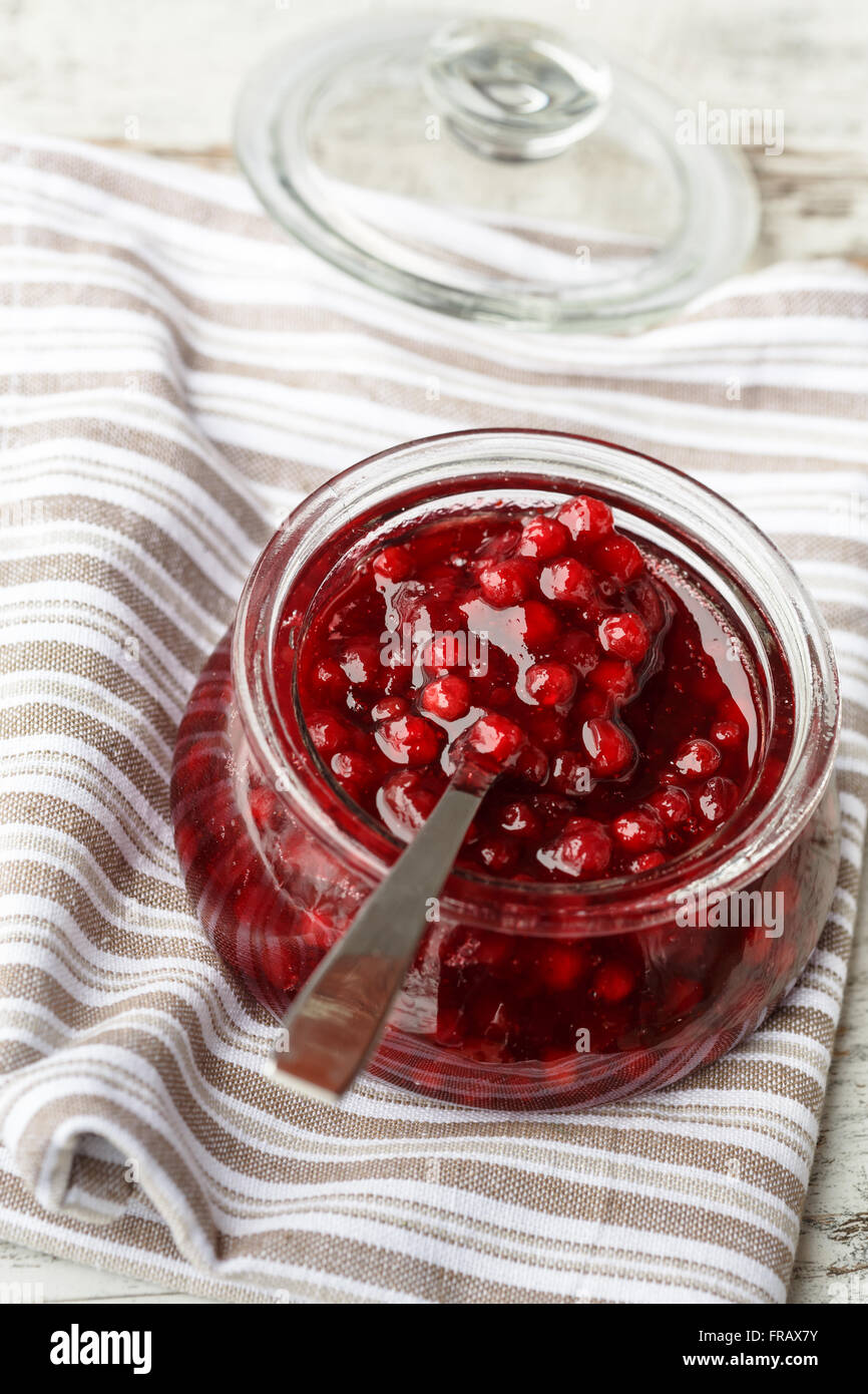 Cranberries jam in a glass bowl Stock Photo