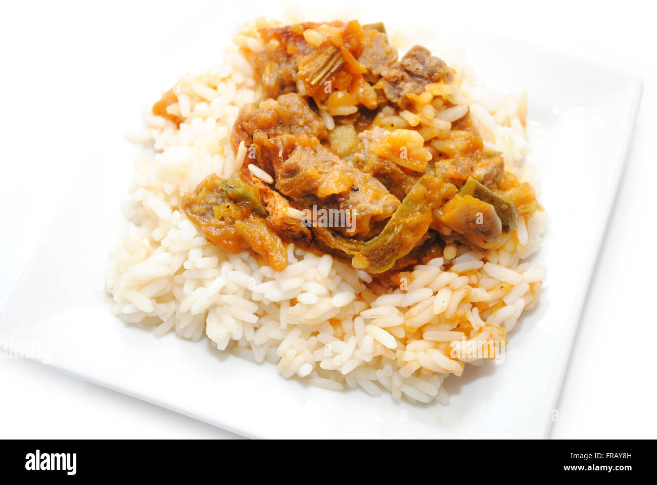 Beef and Pepper Stir Fry Over White Rice Stock Photo - Alamy