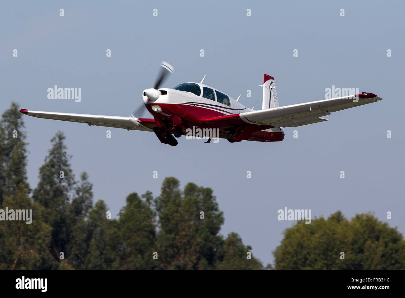 Mooney M20K (registration N1164G) takes off from Palo Alto Airport (KPAO), Palo Alto, California, United States of America Stock Photo