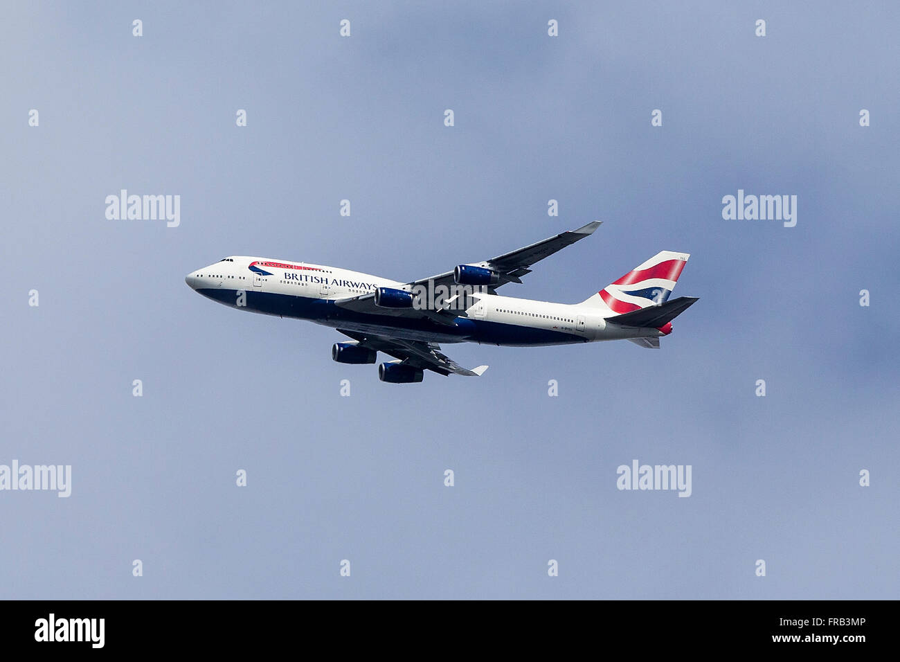 British Airways Boeing 747-436 (registration G-BYGG) flies over Palo Alto, California, United States of America Stock Photo