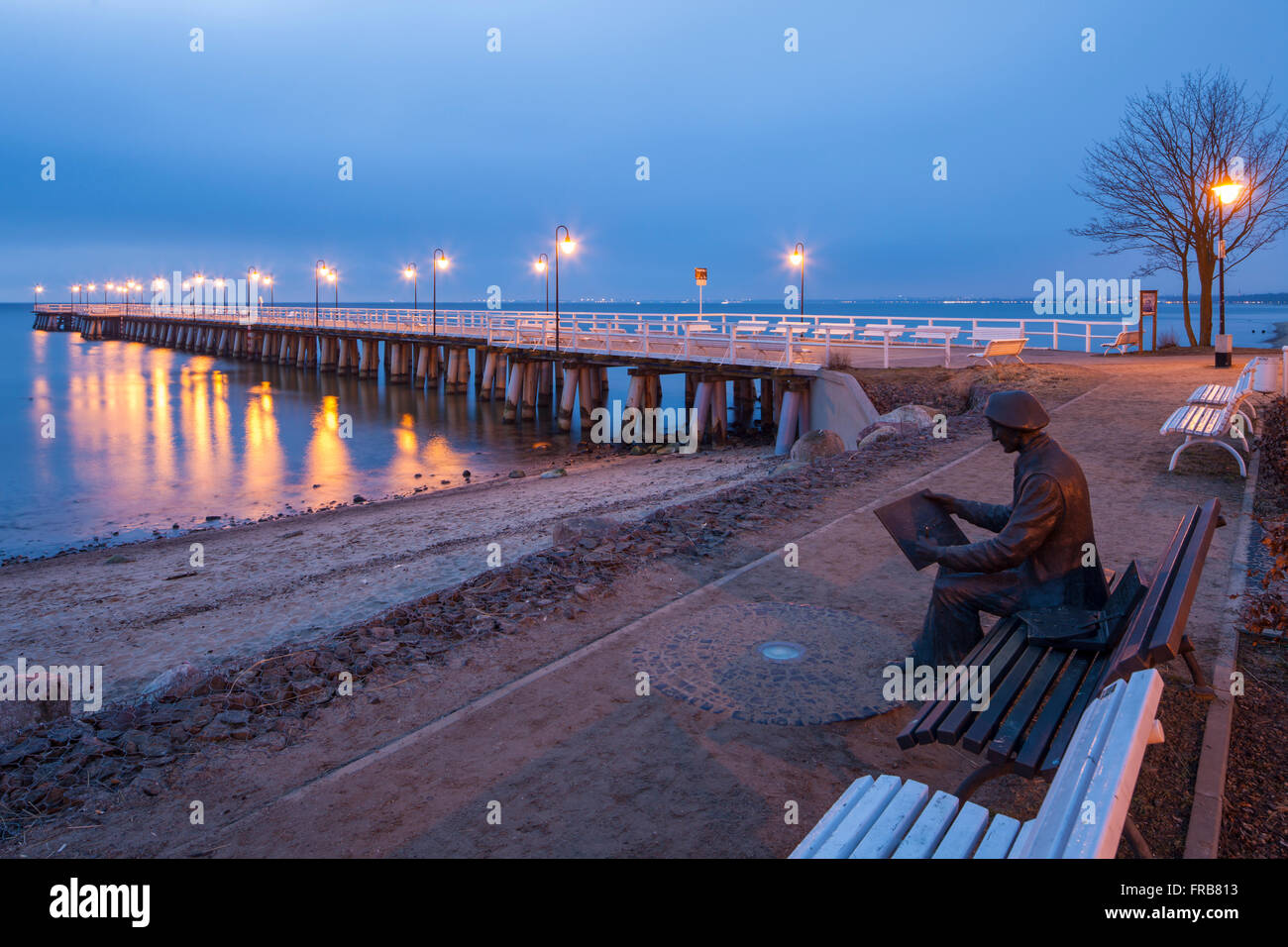 Moody winter dawn at Orlowo Pier in Gdynia, Poland. Stock Photo