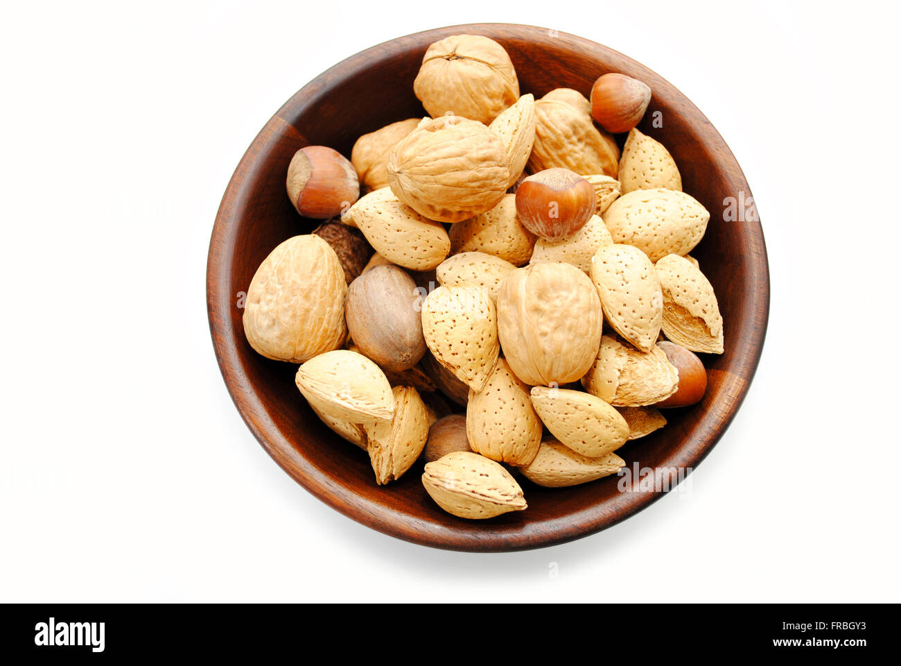 Wooden Bowl Filled with Whole Mixed Nuts Stock Photo