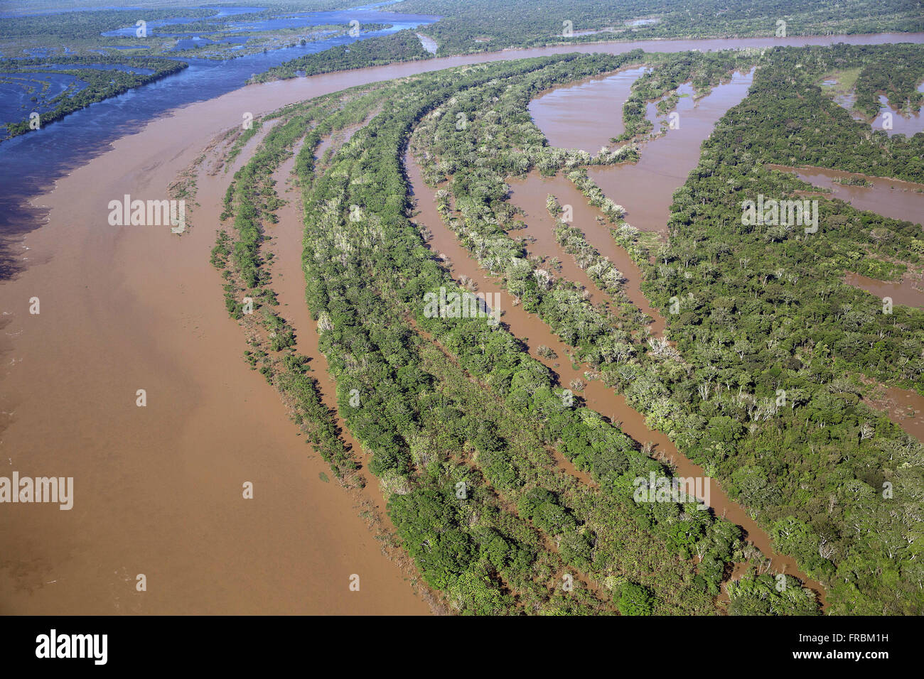 Aerial view of Rio Guapore meeting between dark and clean waters with the Mamore River Stock Photo