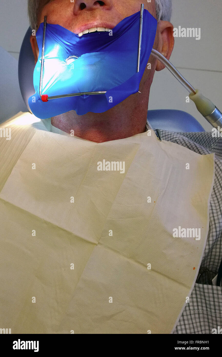 Dental office - attending dentist patient Stock Photo