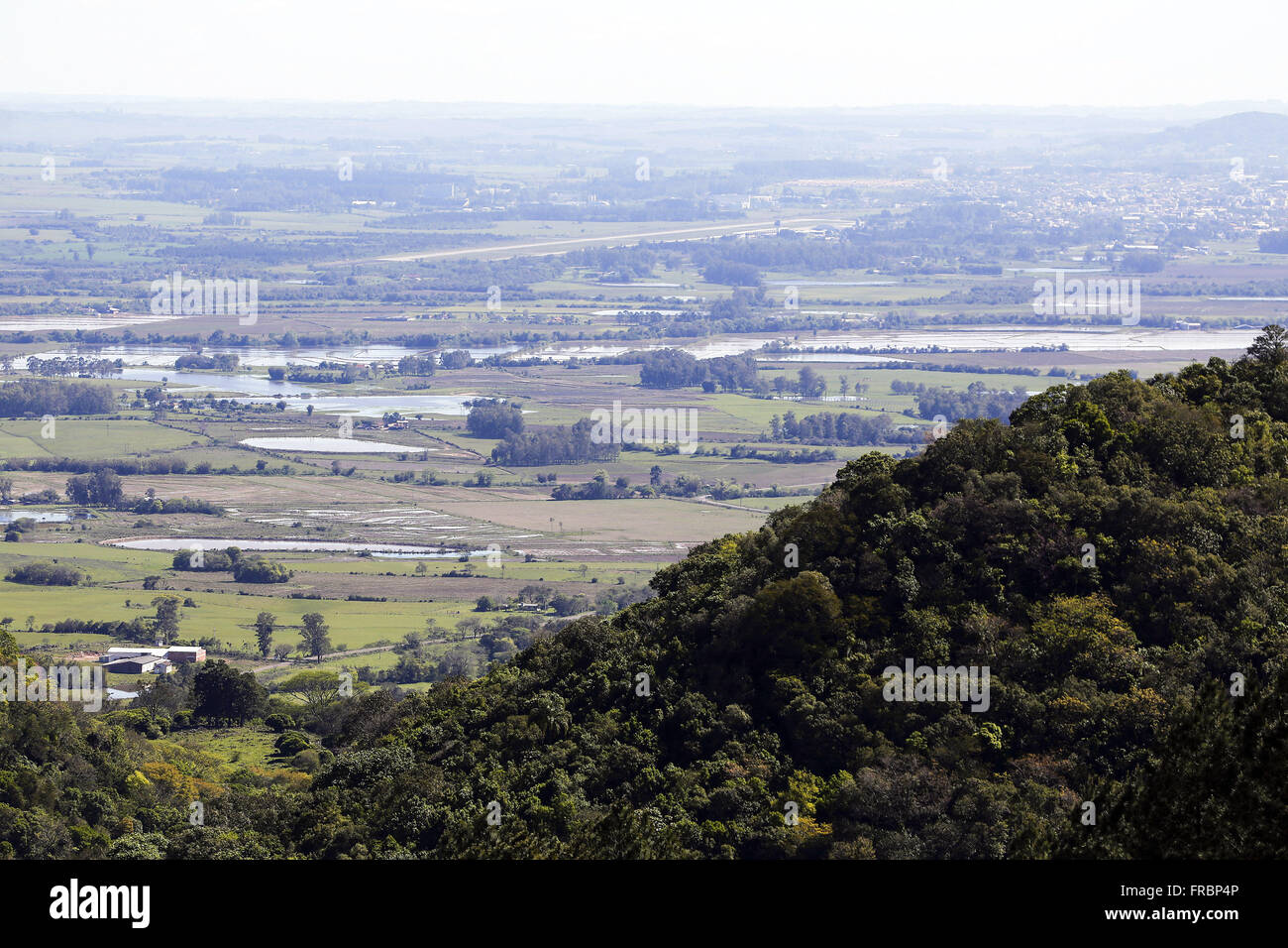 Top view of small town in the valley between mountains Stock Photo - Alamy