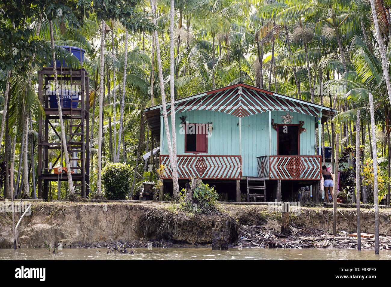 House on stilts on the banks of river Guama - Hole Nazario - Island of the Jaguars Stock Photo