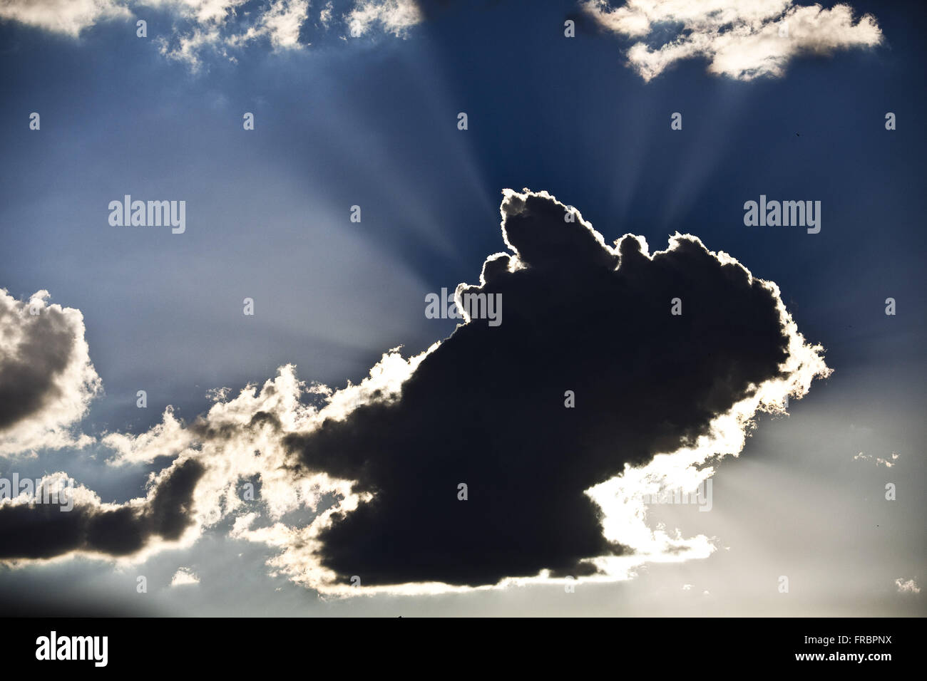 Rain cloud in the late afternoon Stock Photo