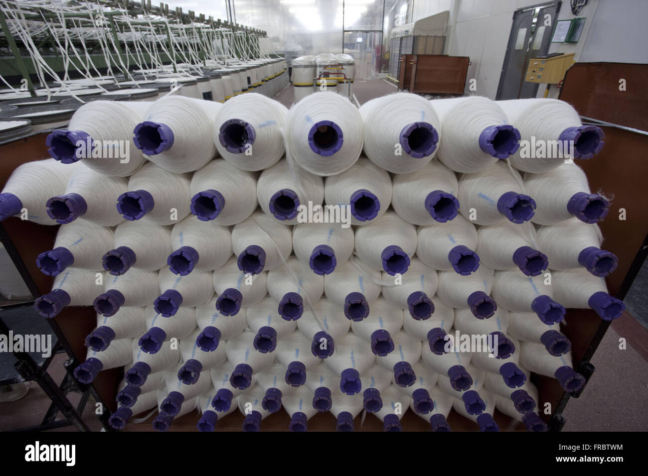 Rolls after stretch and twist yarn - yarn industry in cooperative Stock Photo
