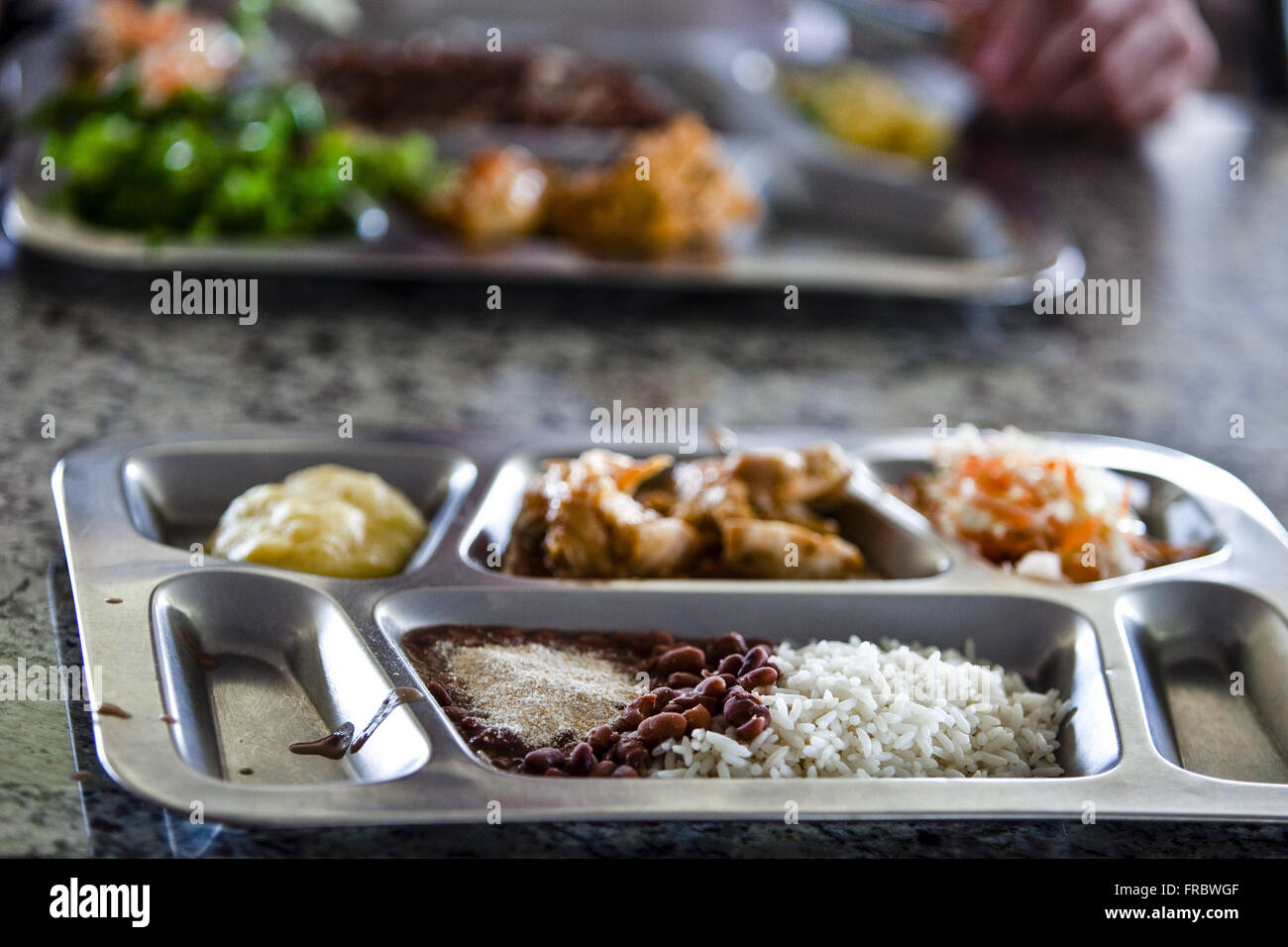 Detail of lunch workers in agribusiness cooperative Stock Photo