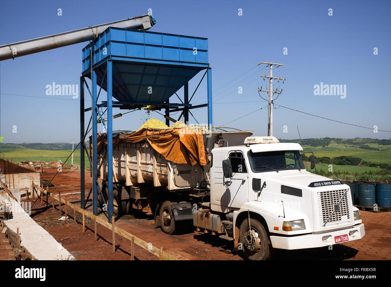 Shipment of waste-producing industry of orange juice in truck Stock Photo