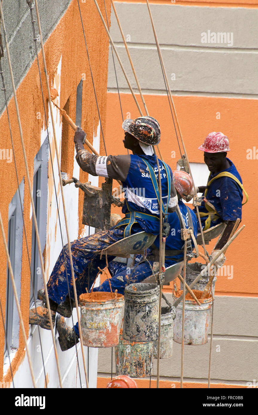 Workers doing outdoor painting Itaoca Condominium Housing Development Stock Photo