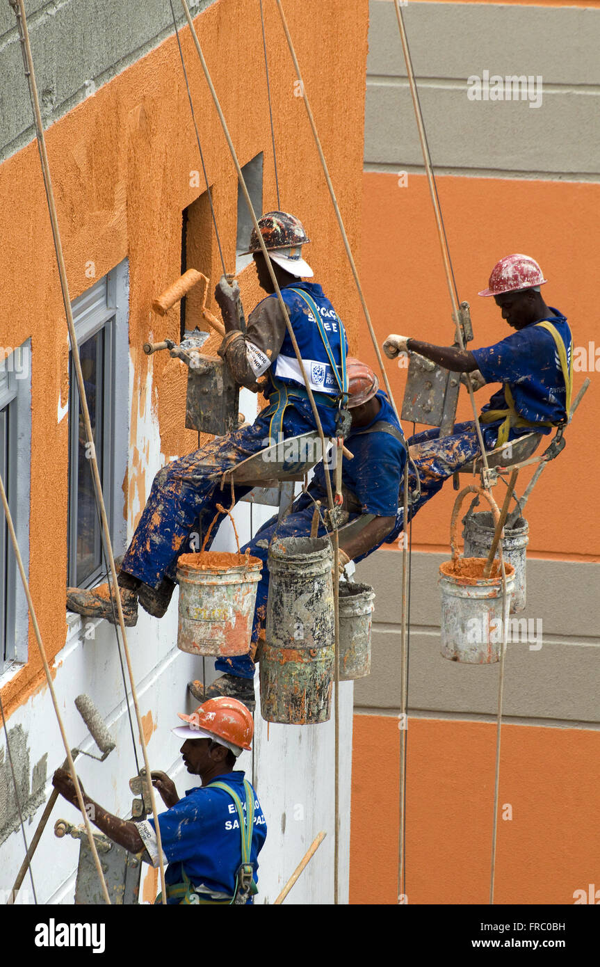 Workers doing outdoor painting Itaoca Condominium Housing Development Stock Photo