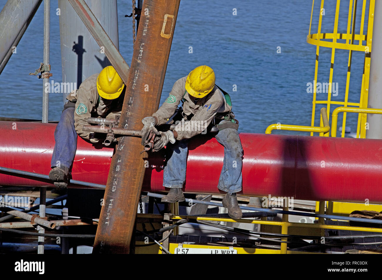 Workmen working on the P-57 oil platform Petrobras Stock Photo