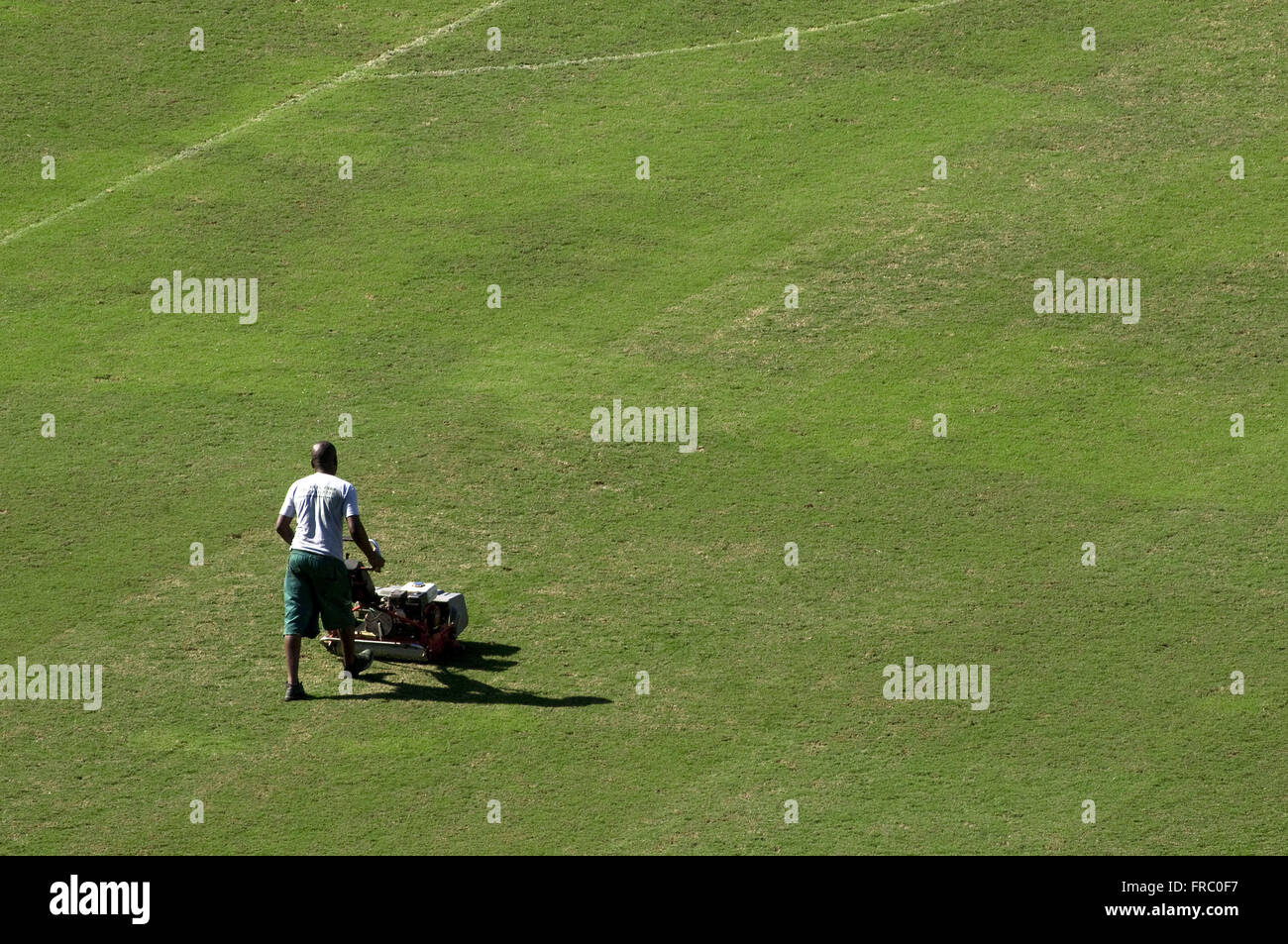 Employee cutting the grass Journalist Estadio Mario Filho - Maracana Stock Photo