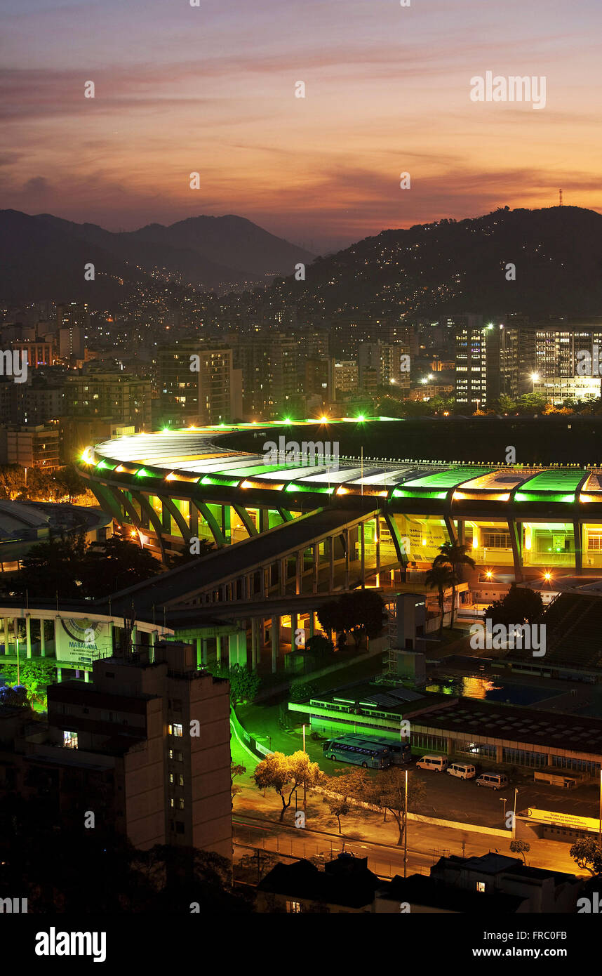 Journalist Estadio Mario Filho illuminated at dusk - Maracana Stock Photo