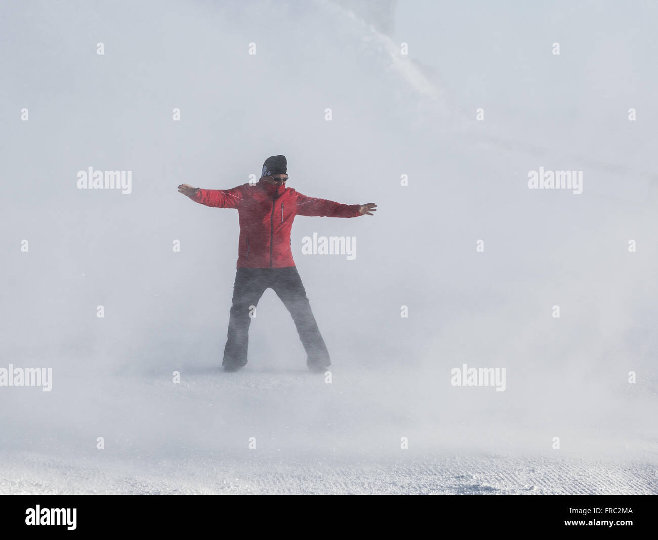 Man in Snow Storm Stock Photo