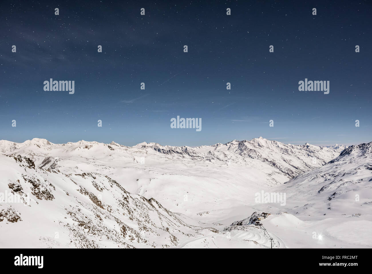 Snowy Alps with night sky Stock Photo