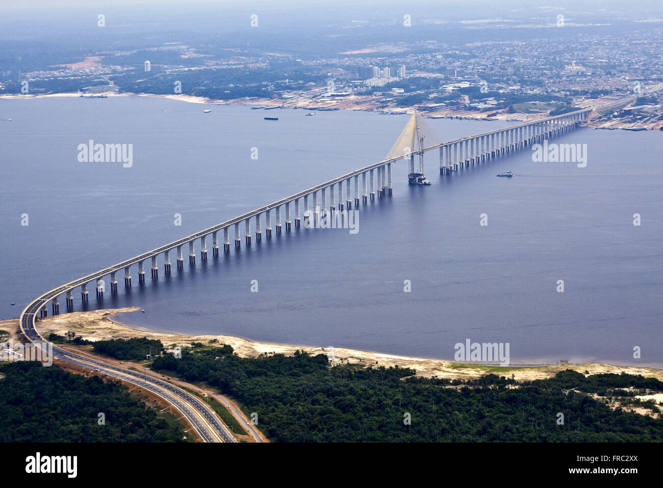Aerial view of the bridge over the Black River which connects the city of Manaus Iranduba Stock Photo