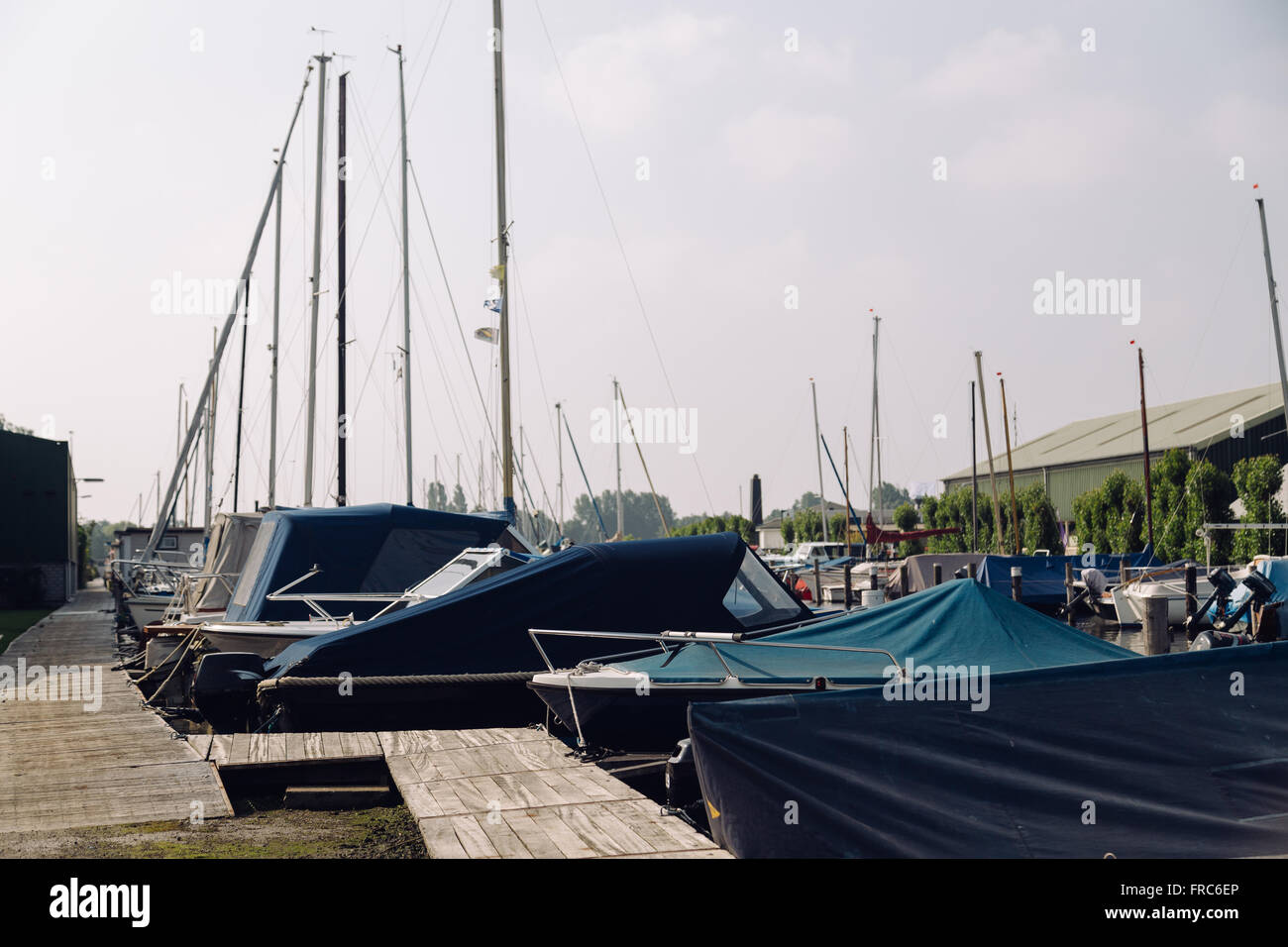 Boats tied up along side hi-res stock photography and images - Alamy
