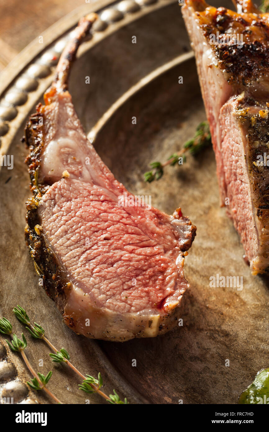 Homemade Herb Roast Lamb with Green Sauce Stock Photo Alamy