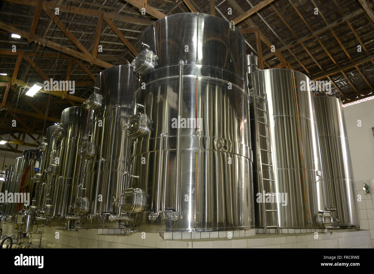 Inside view of wine in stainless steel vats Stock Photo