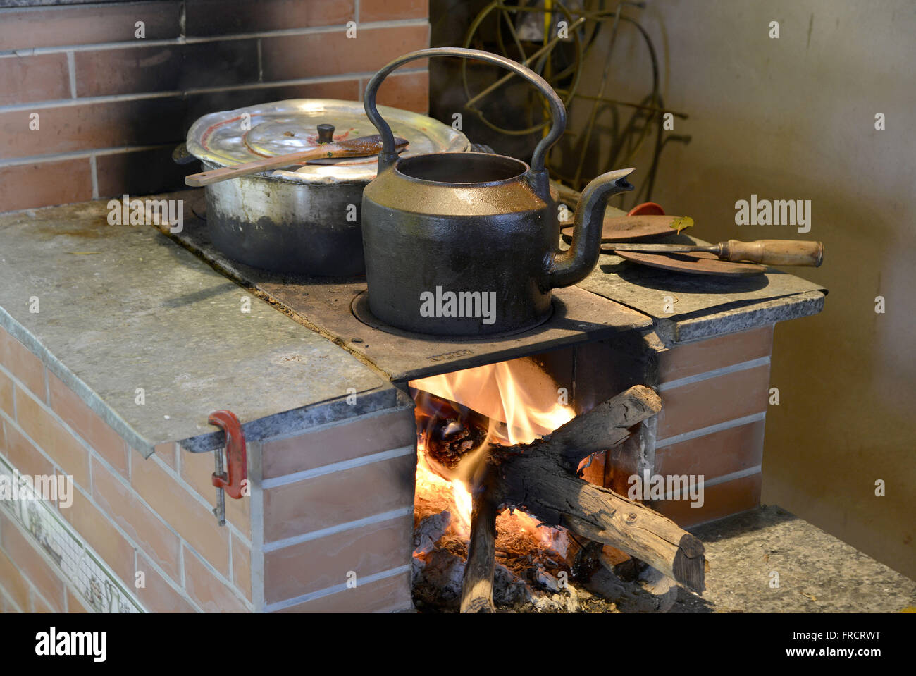 Jerk chicken cooked in wood-burning stove Stock Photo