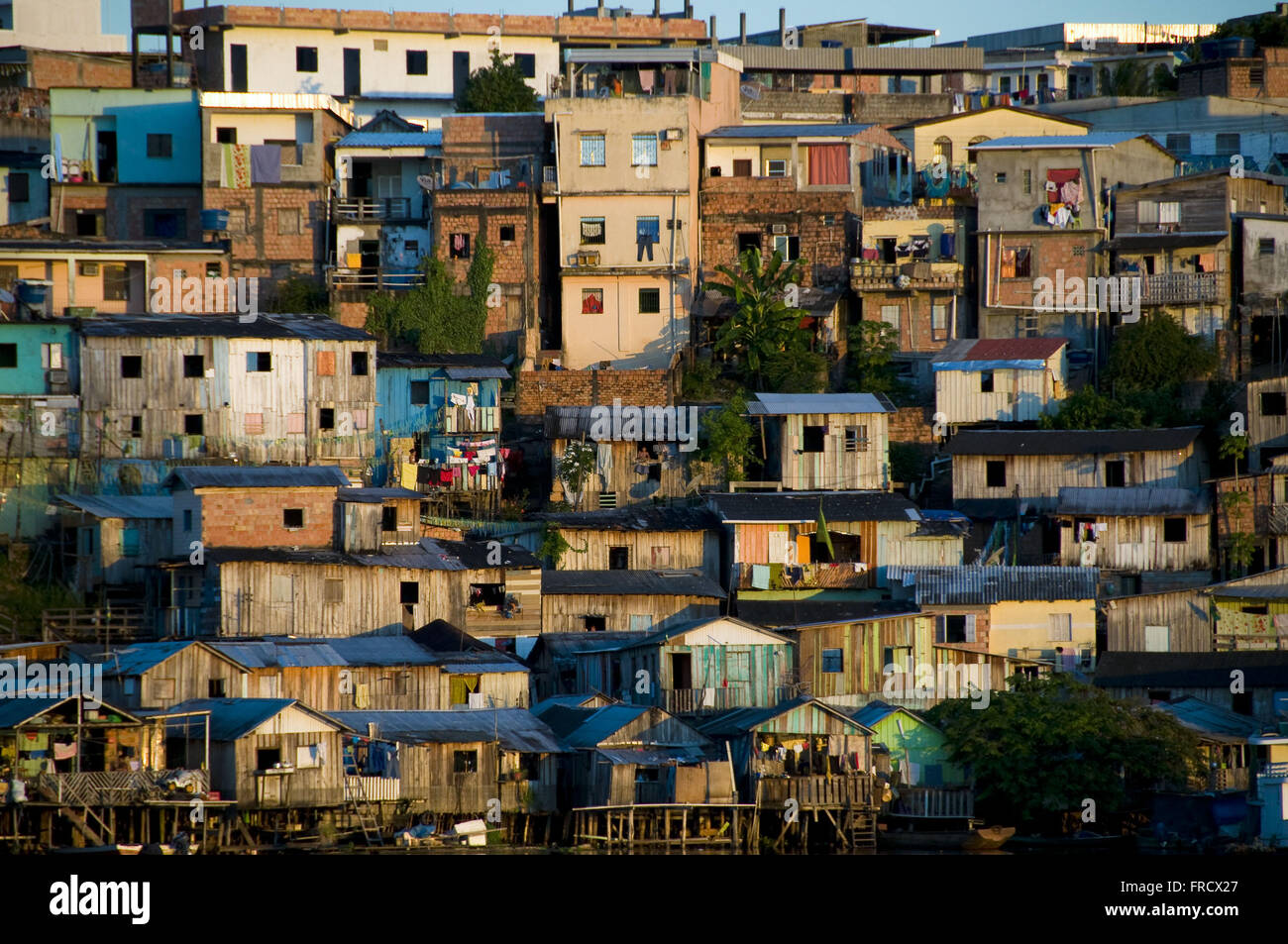 Habitation and stilts on the banks of the creek Educandos city of Manaus Stock Photo