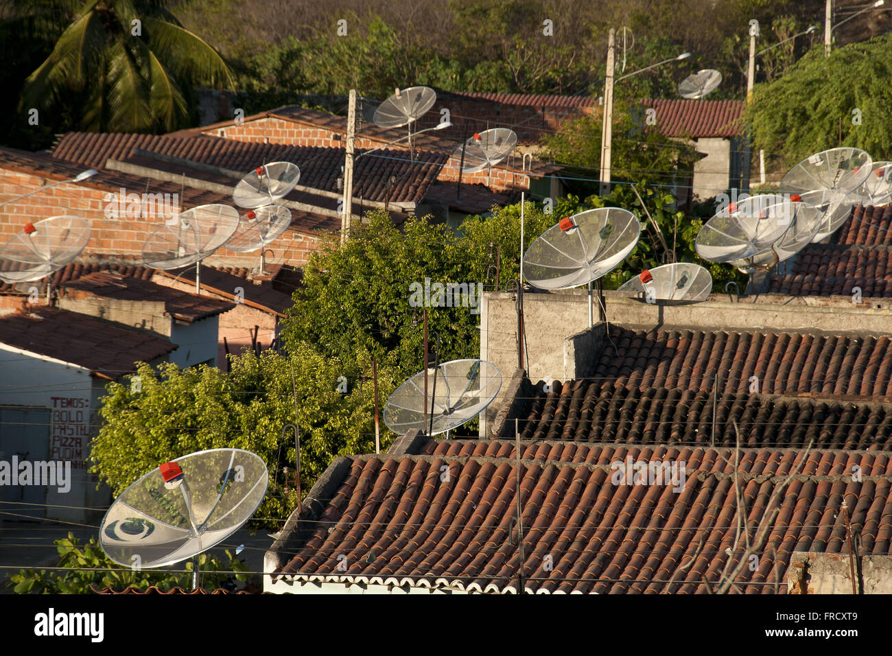Simple houses with parabolic antenna on the outskirts of Willow Stock ...