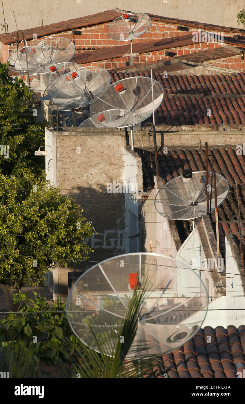 Simple houses with parabolic antenna on the outskirts of Willow Stock ...