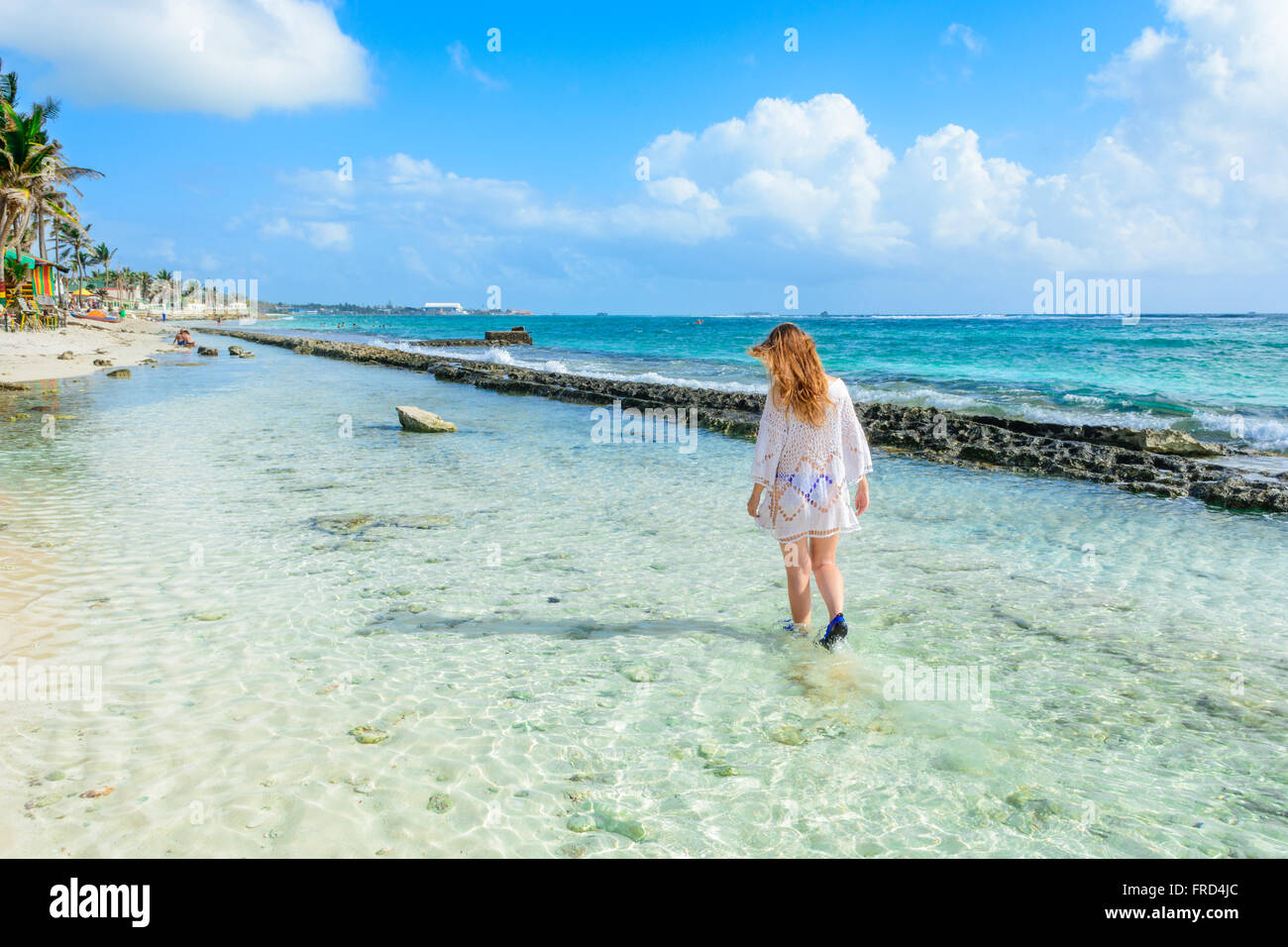 Girl walking at the beach in Colombia Stock Photo
