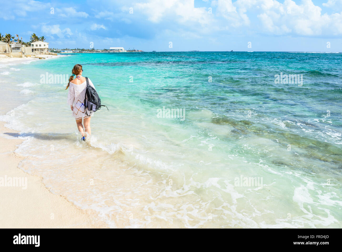 Girl walking on the beach in Colombia Stock Photo