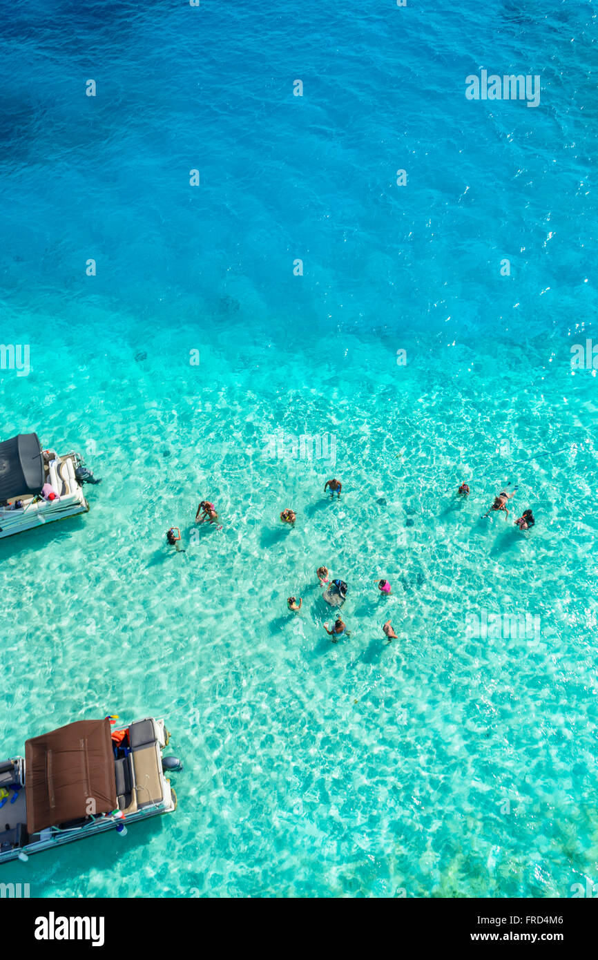 Aerial View of a group of people on the sea Stock Photo