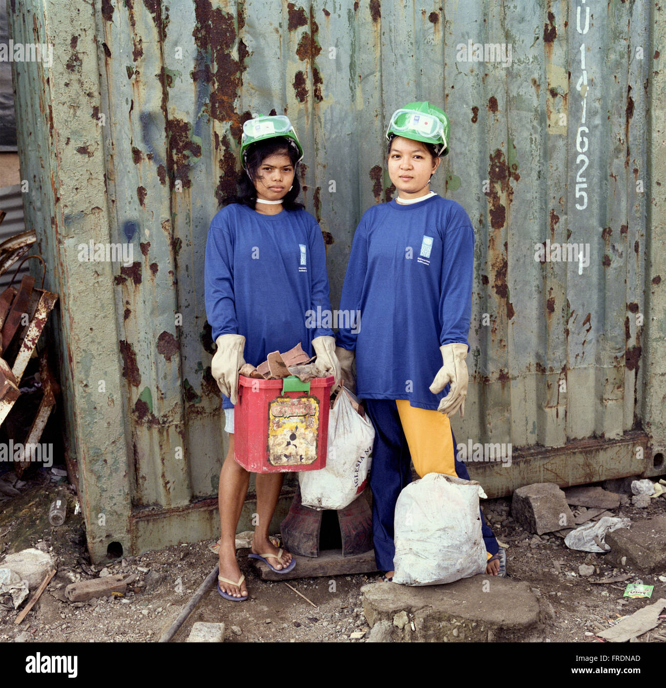 Tacloban; Philippines January 6, 2014 Cousins take part in clearing