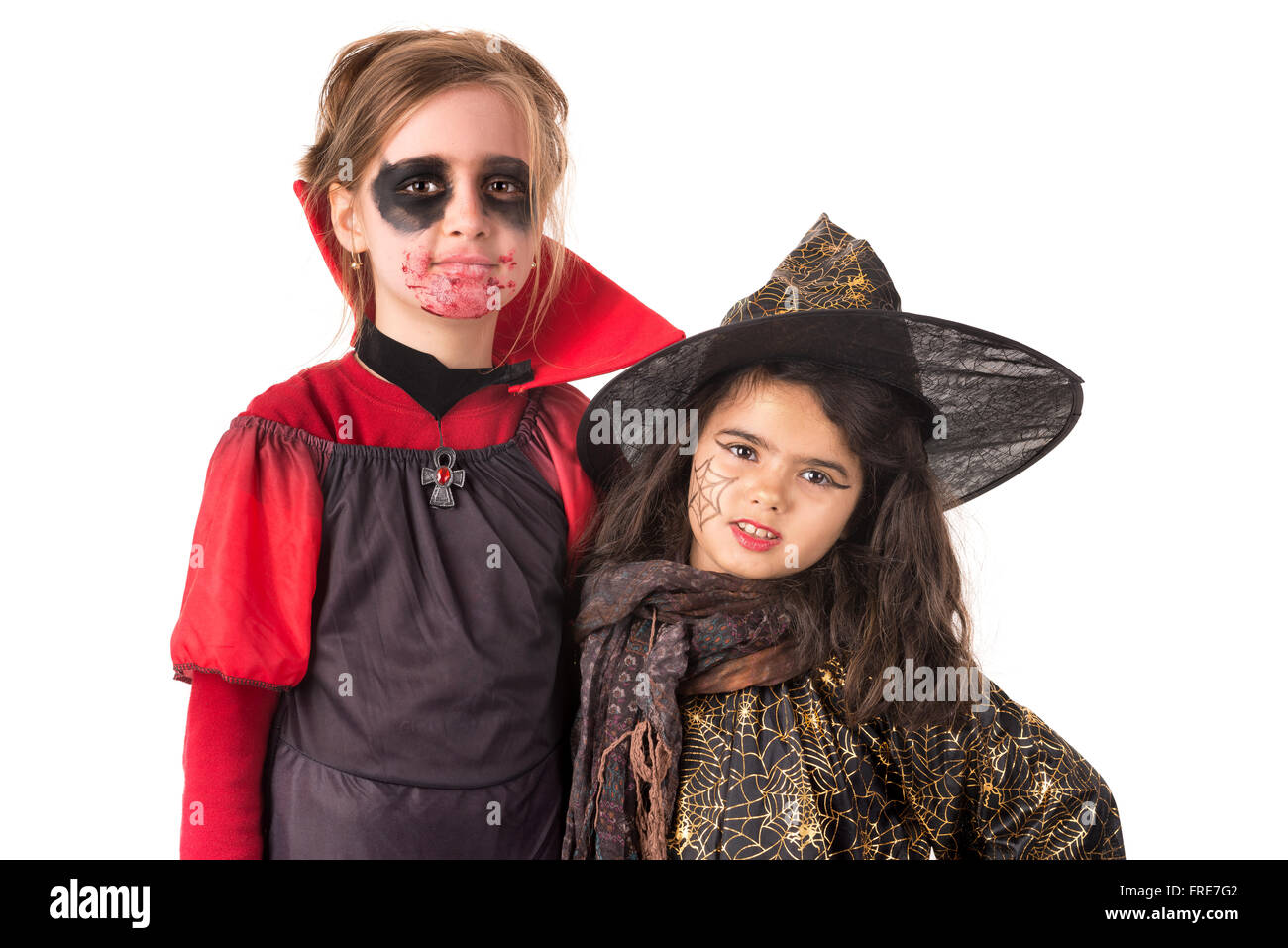 Kids posing in Halloween costumes isolated in white Stock Photo - Alamy
