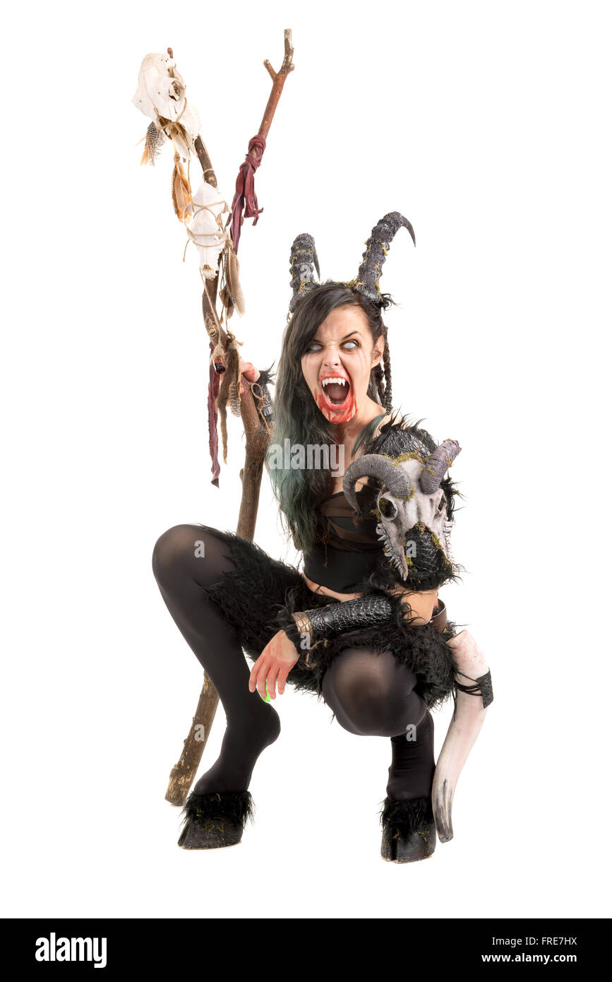 Faun sorceress with big horns and blood isolated in white Stock Photo