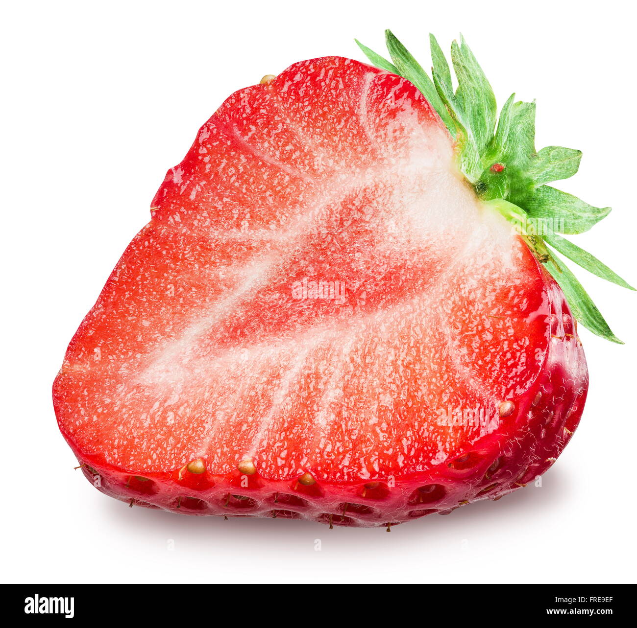 One half of strawberry on the white background. File contains clipping paths. Stock Photo