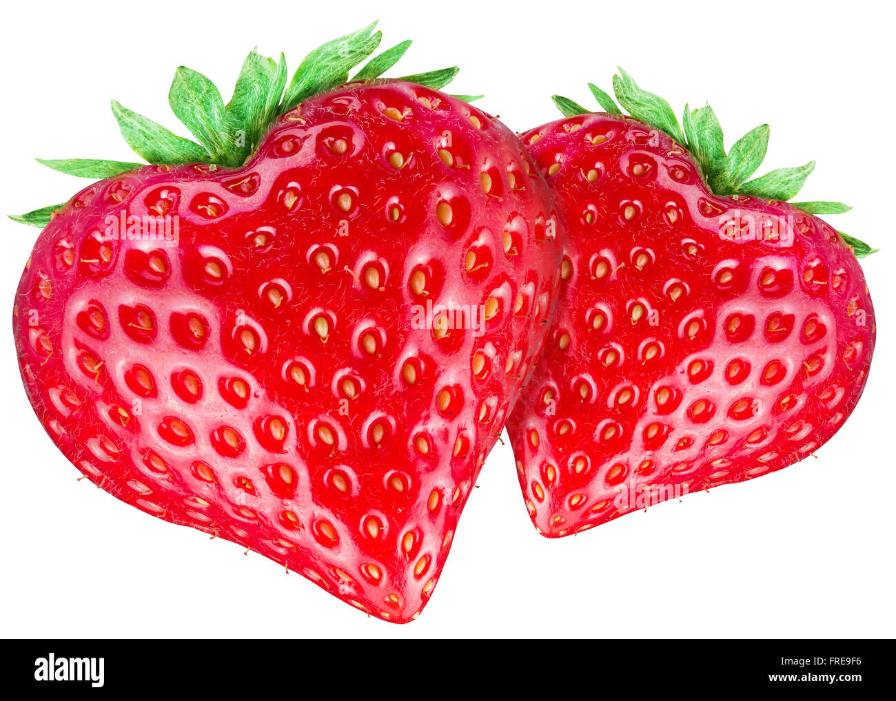 Two strawberry hearts. Isolated on a white background. Clipping path. Stock Photo