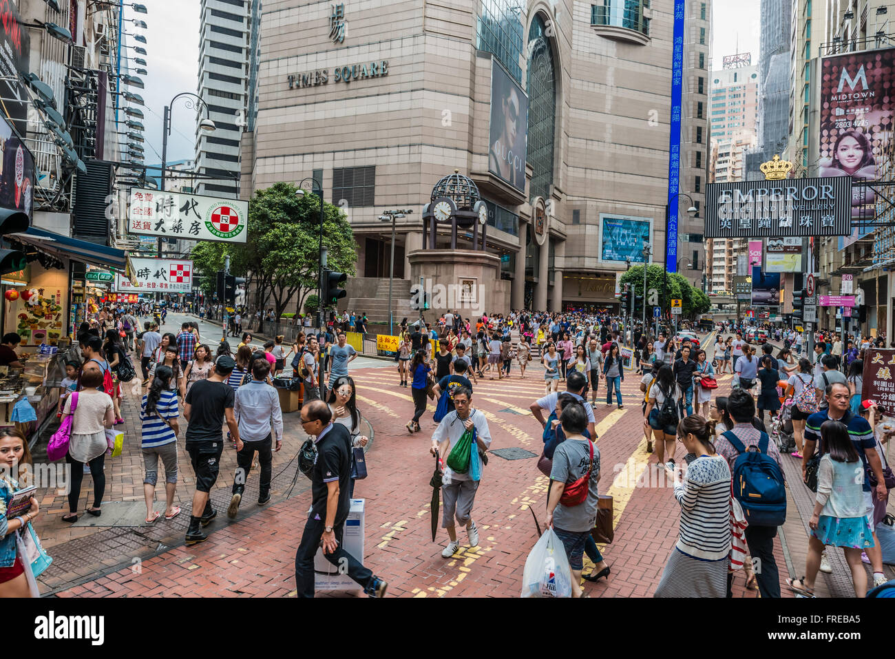 Causeway Bay, Hong Kong, China- June 7, 2014: people walking in the street outside Times Square Stock Photo