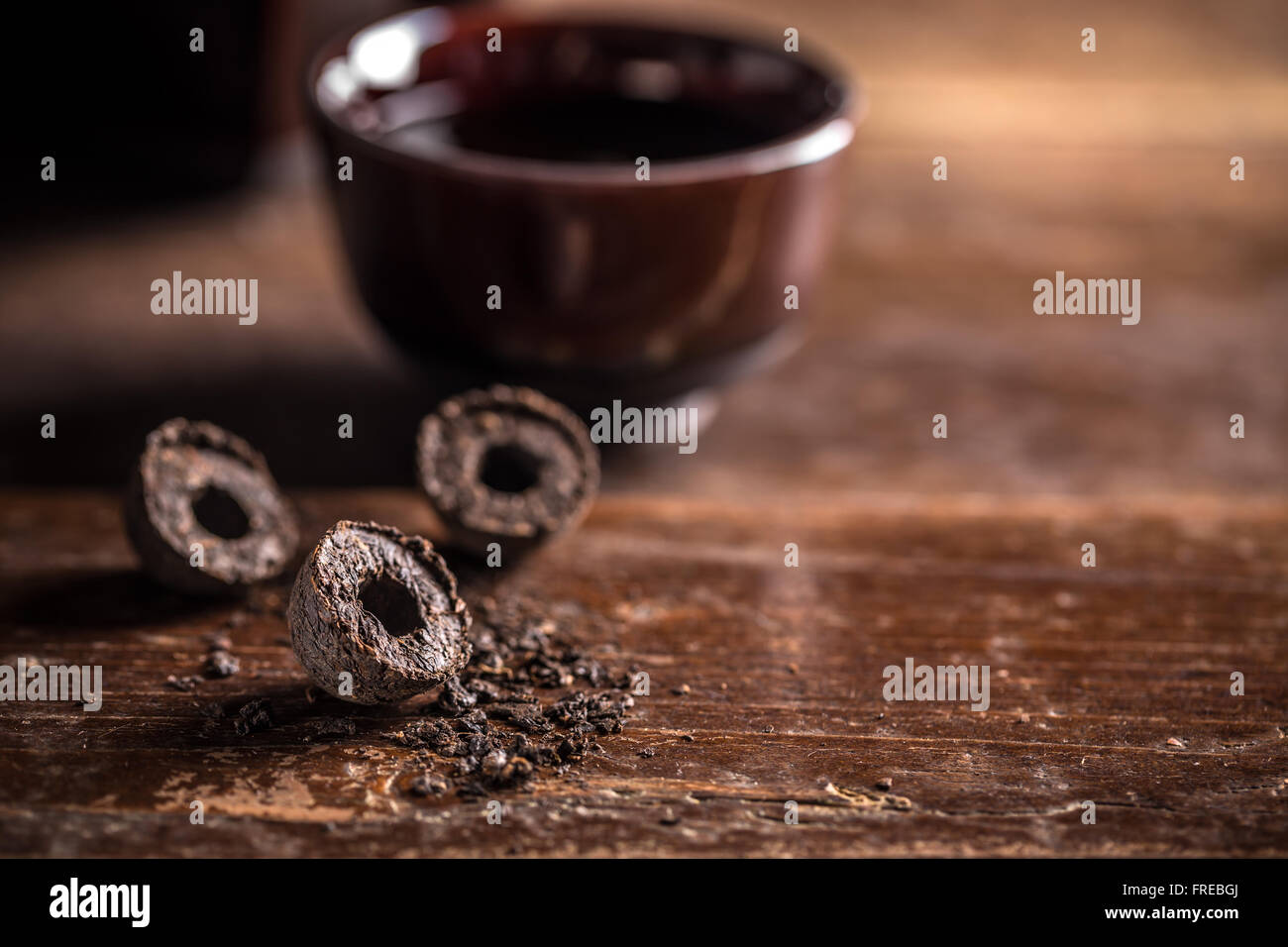 Pressed black pu-erh tea with space for text Stock Photo