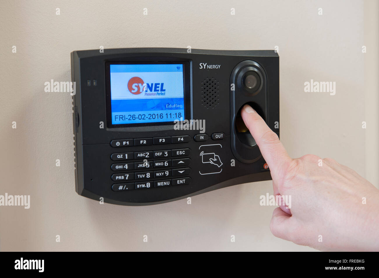Biometric identification fingerprint recognition security access control in use Stock Photo