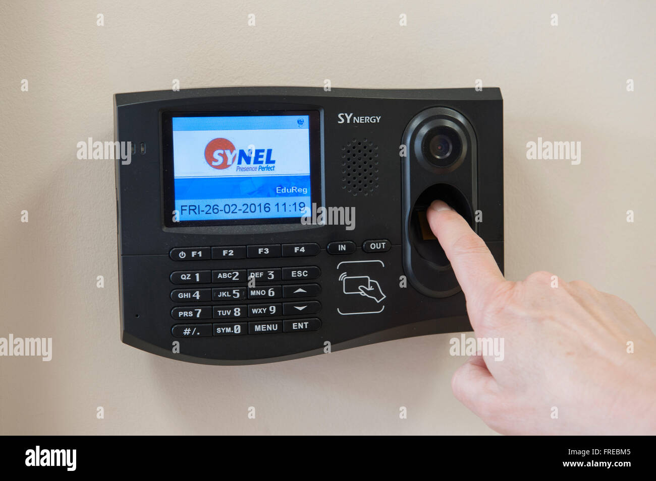 Biometric identification fingerprint recognition security access control in use Stock Photo