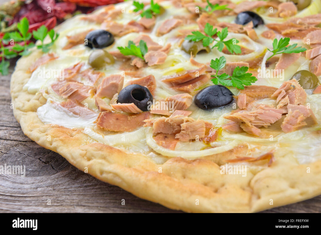 Tuna, olives and onion pizza Stock Photo Alamy